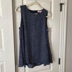 Navy and white polka dot sleeveless blouse